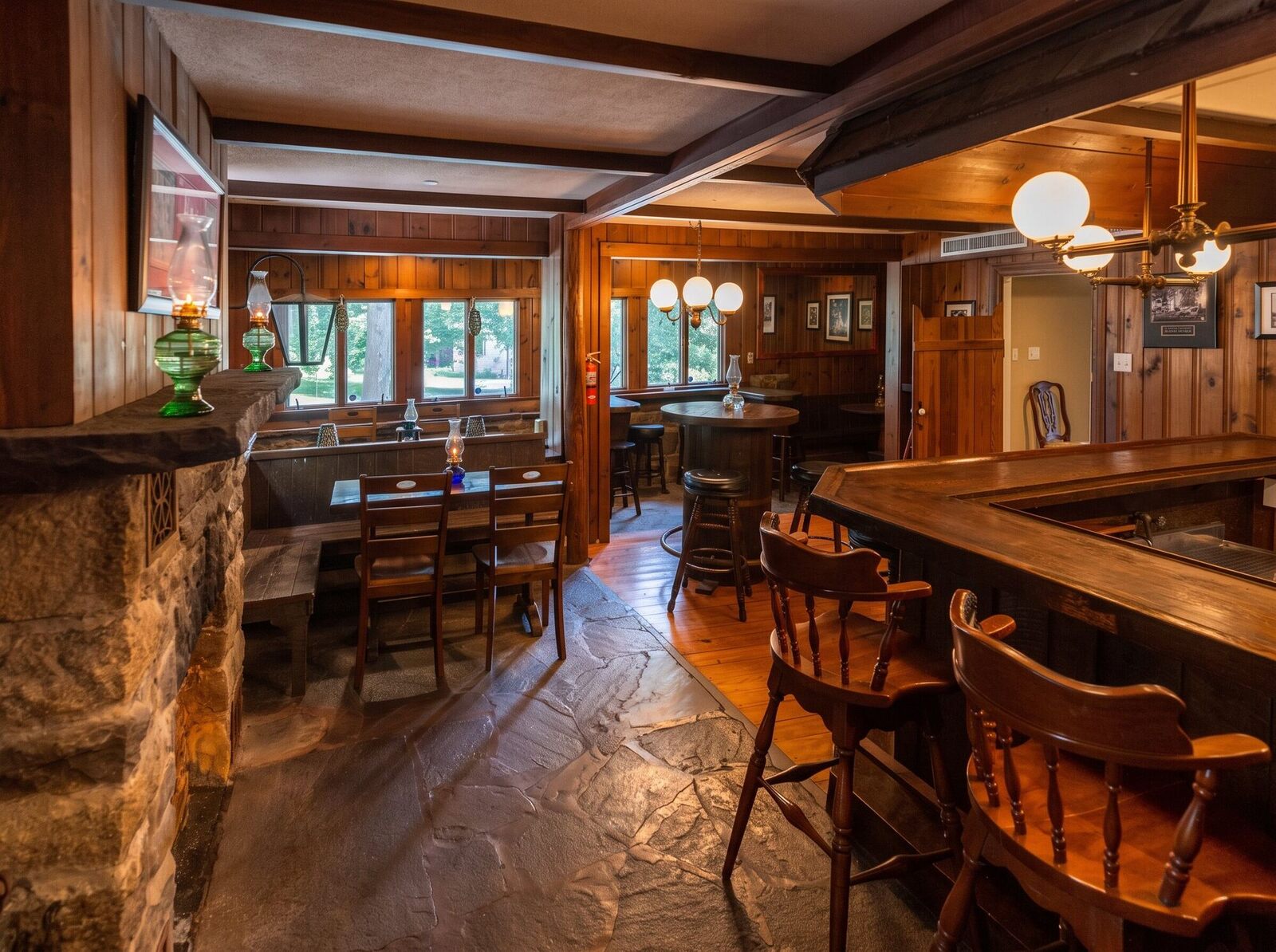 The old tavern where breakfast was served, oil lanterns on the stone mantel and the tables.